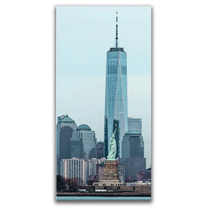 Vertical View Of 1 World Trade Center And Statue Of Liberty